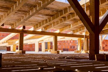 Wooden attic under construction, building site