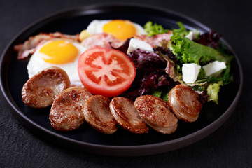 continental breakfast, countryside style meals, nourishing morning food. roasted eggs, sausage and salad