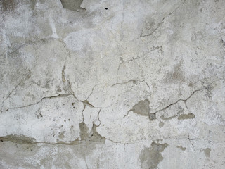 Obraz na płótnie Canvas old gray wall with cracked