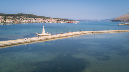 The obelisk and the de Bosset bridge on lakeside in Argostoli, Kefalonia, Greece
