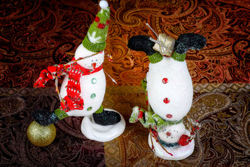 Snowman with Santa's hat and red scarf 