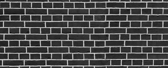 Fototapeta na wymiar Vintage Black wash brick wall texture for design. Panoramic background for your text or image.