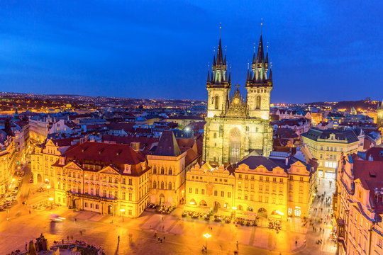 Summer evening twilight aerial panorama of the illuminated Old Town Square and Church of Our Lady Tyn in Prague, Czech Republic