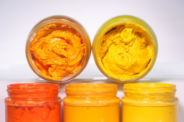 light yellow orange and yellow are warm tone color of printing screen ink in white background ..