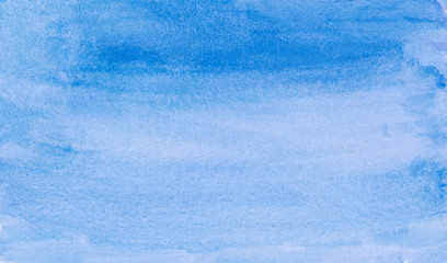 Abstract hand painted blue full frame watercolor background with watercolour stains and paper...