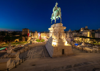Rome (Italy) - Piazza Venezia square in blue hour during the Christmas holidays, with lights decorations and Christmas tree named Spelacchio