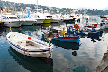 Obraz premium Santa Margherita Ligure, Italy 04-12-2011 Fishing boats in the port of Santa Margherita, a coastal city on the Italian Riviera.