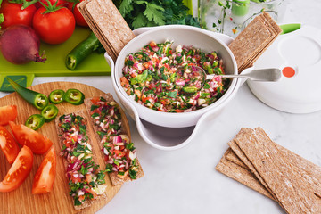 Crisp breads with salsa and cream from above