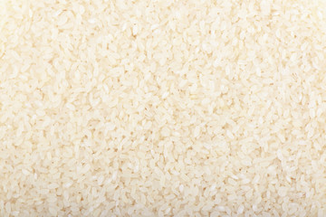 Rice for pilaf from Central Asia as background