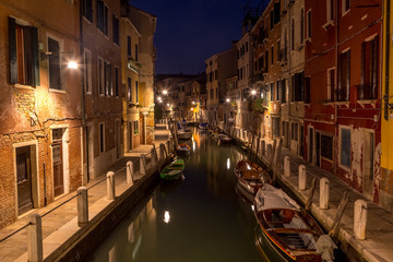 Fototapeta na wymiar Night Canal in Venice with beautiful lights