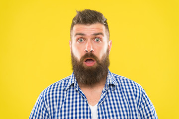 Guy surprised face expression. Hipster with beard and mustache emotional surprised expression....