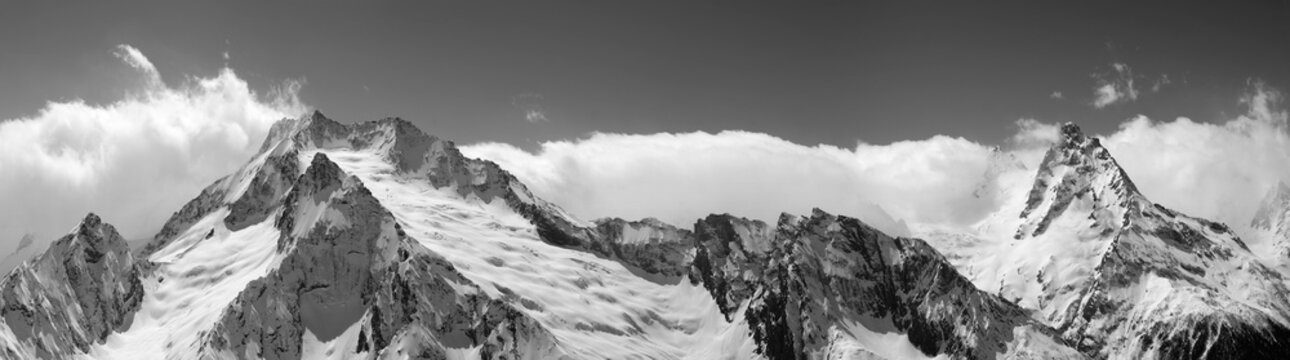 Fototapeta Panorama of snowy covered mountain peaks