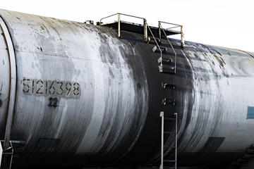 Ladder with access to a large tank, cargo tanks on the railway, transportation of oil