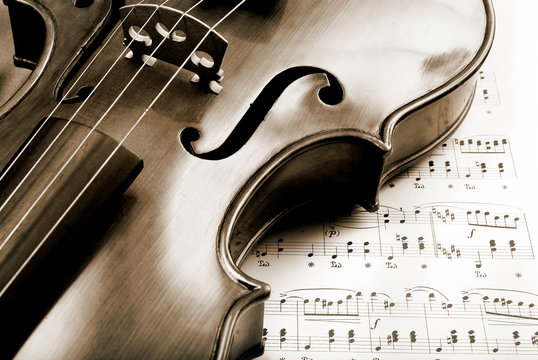 Violin on sheet music. black and white. close up. Stock Photo | Adobe Stock Violin on sheet music. black and white. close up. Stock Photo | Adobe Stock