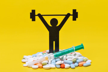 weightlifting pictogram wiht pills
