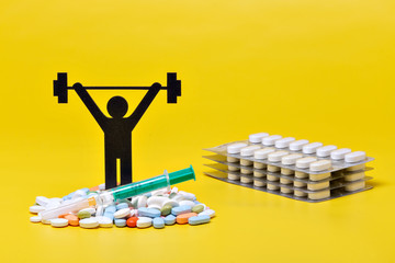 weightlifting pictogram wiht pills