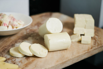 Various types of cheese on Hotel restaurant table. Buffet cateri