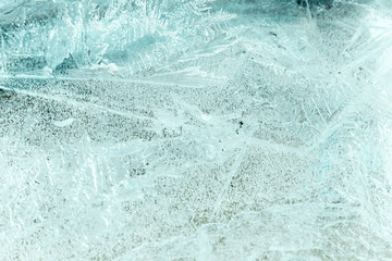Abstract bright blue frozen background of ice
