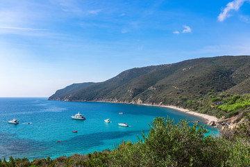 Fototapeta na wymiar Panoramic view of the hidden blue lagoon of Elba Island. Tuscany, Italy.
