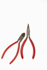 Beautiful hobby snipe-nose pliers and side cutters isolated on white background. Tools for hobby. Free time / interest concept.