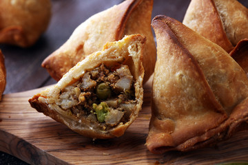 Vegetarian samsa or samosas.Indian special traditional street food punjabi samosa or Coxinha, Croquete and other Fried Brazilian Snacks