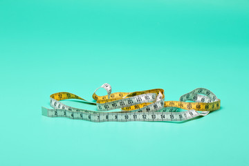 Yellow and white measure tape