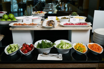 Hotel restaurant buffet catering table with Vegetarian food, clo