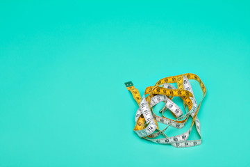 Yellow and white measure tape