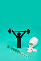 weightlifting pictogram wiht pills