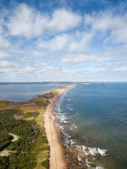 Aerial view of a beautiful sandy beach on the Atlantic Ocean. Taken in Cavendish, Prince Edward...
