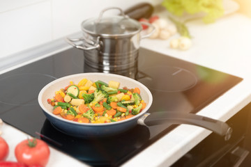 Fresh vegetables fried in a pan. Healthy nutrition concept