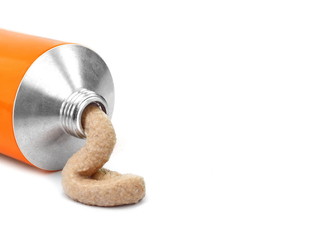 Liver pate from tube isolated on a white background. squeeze out pate from tube