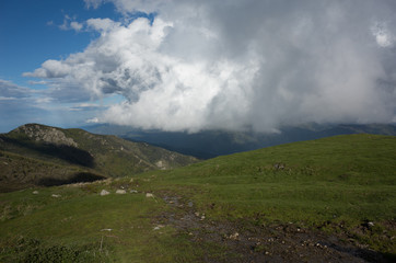 Fototapeta na wymiar clouds over mountains