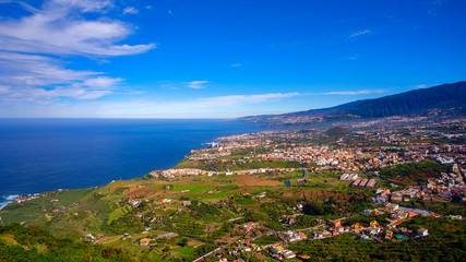 This panoramic photograph, taken at a Mirador in Los Realejos, shows the north coast of Tenerife and the Orotava Valley.