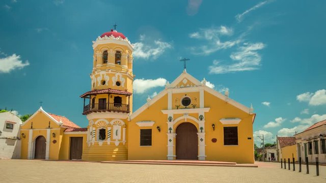 Timelapse of Santa Barbara colonial church in Mompox, Bolivar, Colombia, on a calm sunny day.