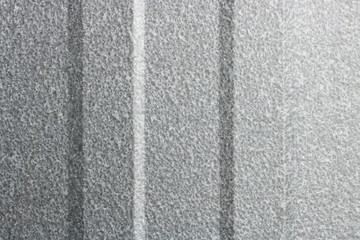 Texture of scratches on old roof metal sheet, abstract background
