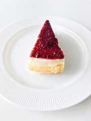 Raspberry yogurt cheese cake on a white background
