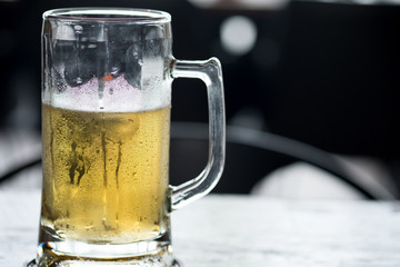Cold craft light and dark Beer in a glass