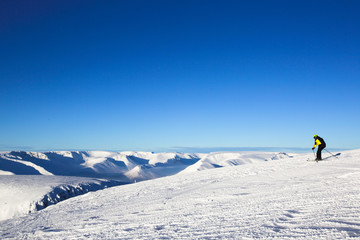 Fototapeta na wymiar Skier on mountain peak
