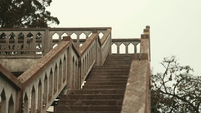 Concrete stairs on Alcatraz island on cloudy day, Moving shot - San Francisco, USA