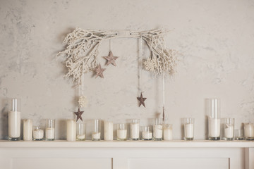 Advent and Christmas candles with stars  on white background