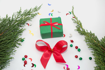 Christmas composition. Frame made of christmas gifts, pine branches, toys on white background, Gift Box, Flat lay, top view, copy space