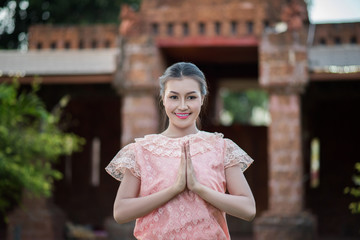 Beautiful Woman wearing typical Thai dress