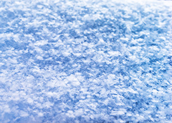 Fresh Snow Texture Background, Natural Snowflakes Pattern with Copy Space. Blue Tone Coloring. Winter Season, Weather Forecast, Climate Change, Greeting Card Image.