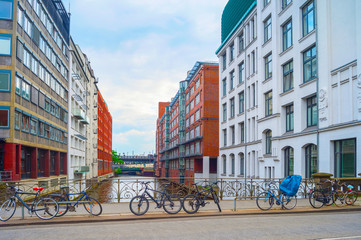 Fototapeta na wymiar Bicycles parking by Hamburg canal