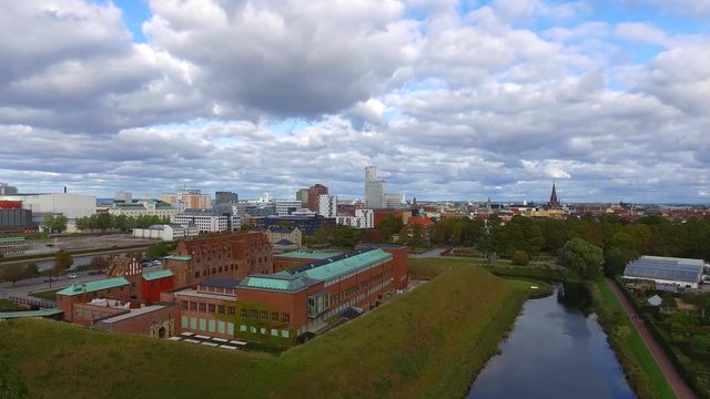 Aerial dolly shot of Malmo Live Malmoe museum and cityscape in 4k.