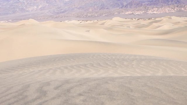 Death Valley Ca, Mesquite sand dunes right pan black sand patterns, Mech slider pan right.mp4