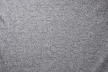 Fototapeta na wymiar Close-up gray t-shirt cotton flat background