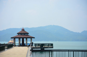 pier and waterfront pavilion, copy space, loneliness concept, sun moon lake, Taiwan