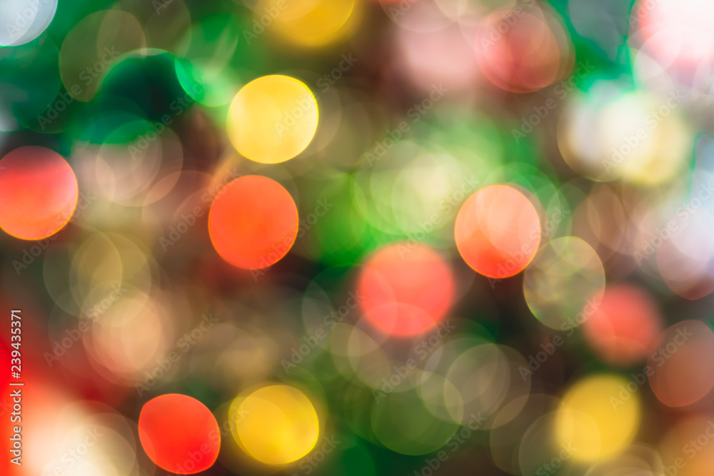Poster Abstract blur decoration ball and light string on christmas tree with bokeh light background.winter holiday seasonal.
